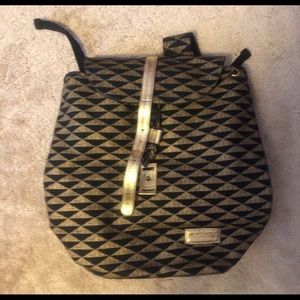 BRAND NEW MANAOLA BACKPACK. with gold trimmings